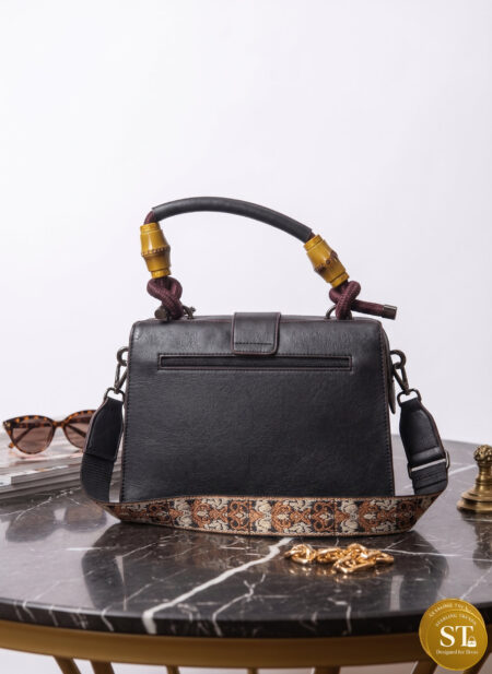 ENGRAVED BLACK MAGESTY Handbag